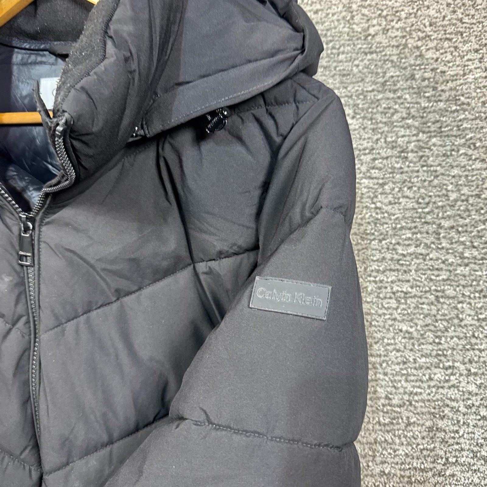 Calvin Klein Black puffer coat with fur hood