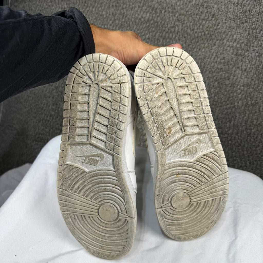 White leather jordan 1 mid