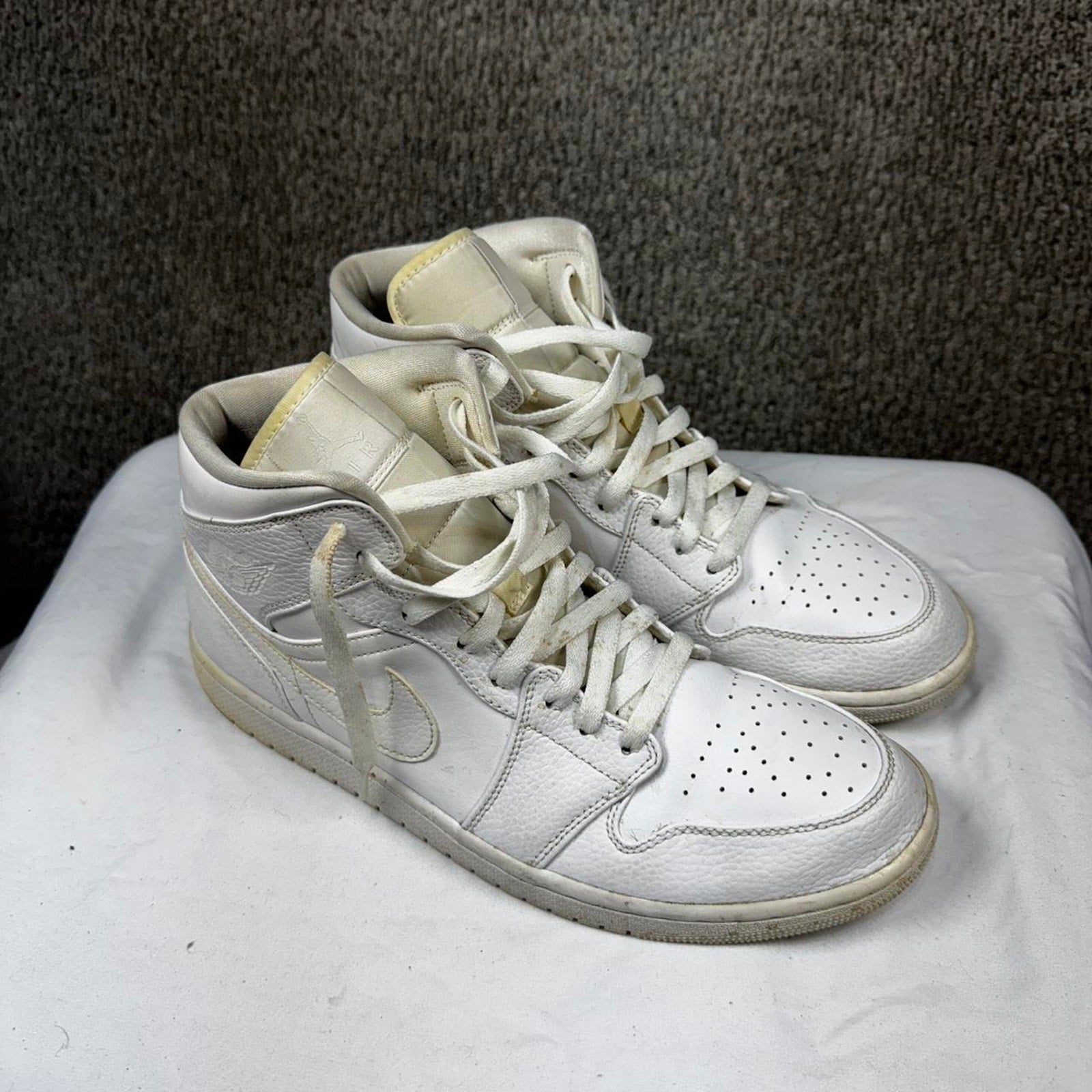 White leather jordan 1 mid